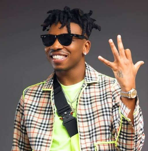 Mayorkun explains why he goes around with a lot of police escorts