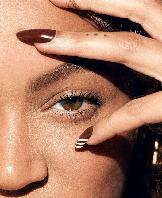Beyonce flaunts her curvy backside and long braids in new sexy photo.?