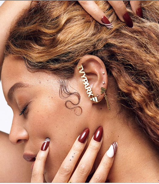 Beyonce flaunts her curvy backside and long braids in new sexy photo.?