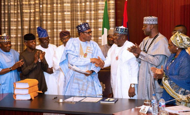 Photos: President Buhari signs 2020 budget into law