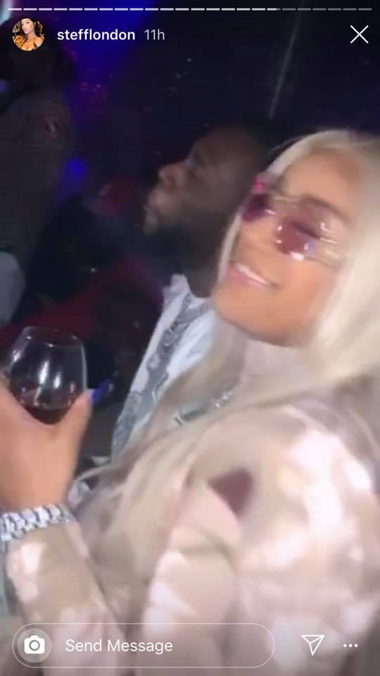 Burna Boy and Stefflon Don hit the strip club, throw money on strippers ( 18+ photos)
