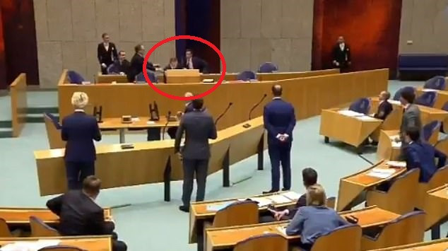 Shocking moment Dutch Health Minister collapses in Parliament due to