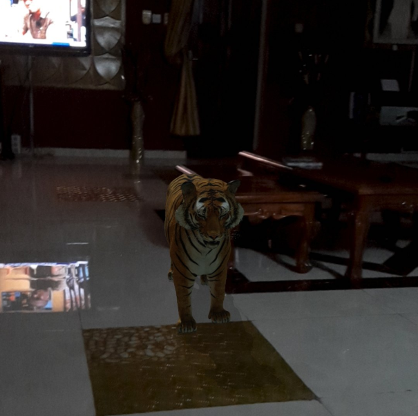 Google gives people a chance to view animals in 3D in their homes and Nigerian parents are having fun with it (photos)