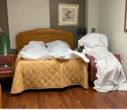 COVID-19: Photos show bodies piled up and stored in vacant rooms at Detroit hospital
