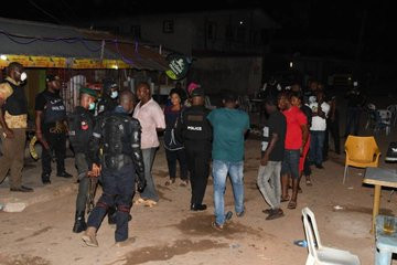 Bar owner and his customers arrested for violating lockdown order in Lagos (photos)