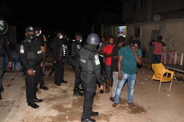 Bar owner and his customers arrested for violating lockdown order in Lagos (photos)