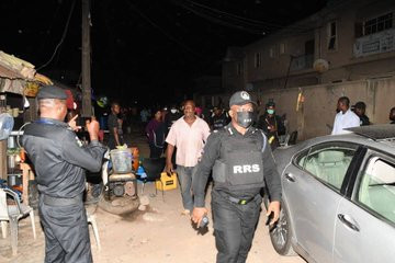 Bar owner and his customers arrested for violating lockdown order in Lagos (photos)