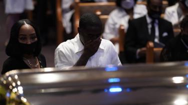 Mourners at George Floyd's coffin in Houston, 9 June