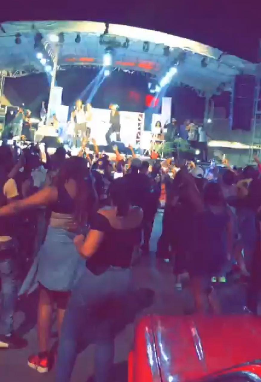 Naira Marley and Kim Oprah trigger an outcry after violating the interstate travel ban and hosting a fully packed show in Abuja (video)