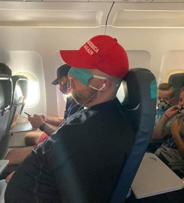 Man becomes a meme after he was pictured wearing a face mask on his eyes and a MAGA hat