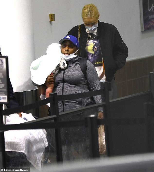New mom, Iggy Azalea pictured arriving in Los Angeles with her baby boy?(Photos)