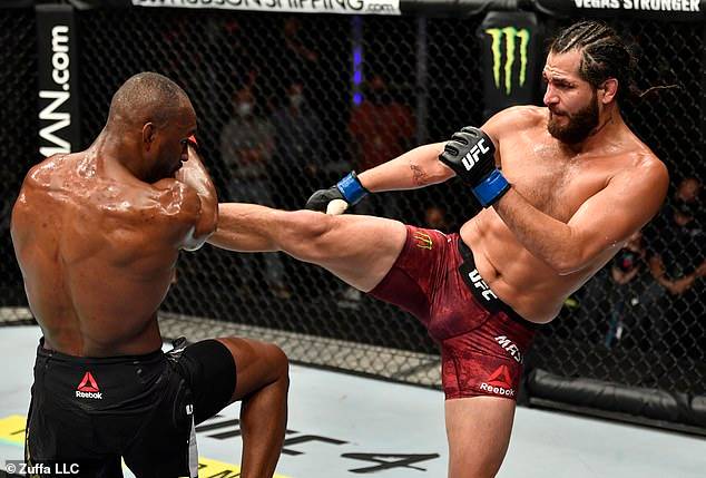 Nigerian UFC star, Kamaru Usman retains his Welterweight title by unanimous win after beating Jorge Masvidal (Photos)