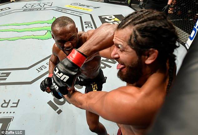 Nigerian UFC star, Kamaru Usman retains his Welterweight title by unanimous win after beating Jorge Masvidal (Photos)