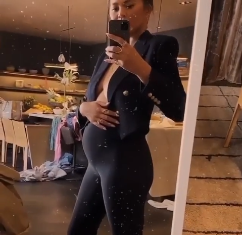  Pregnant Chrissy Teigen flaunts her growing baby bump in new adorable video