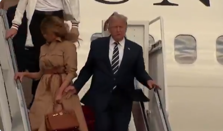Melania Trump pulls her hand away from Donald Trump as she tightly holds onto her $13K Herm?s Birkin bag (Video)