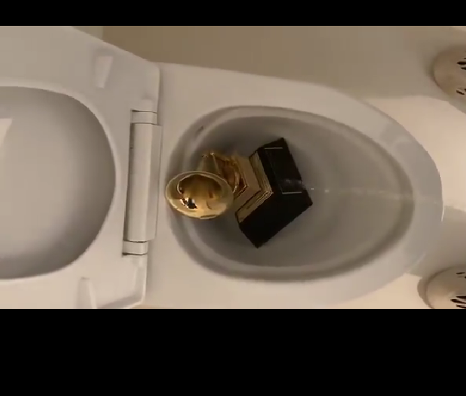 Kanye West urinates on his Grammy award, then tweets more attacks at Universal Music (Tweets/Video)