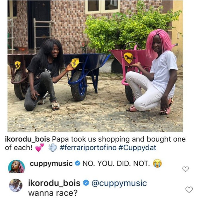 Between DJ Cuppy and Ikorodu Bois as they  challenge her to a race while showing off their own "Ferraris"