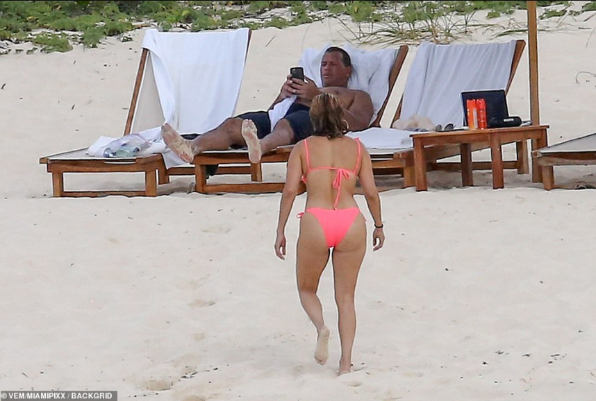 Jennifer Lopez, 51, puts her curves on display in pink bikini, for romantic beach day with fianc? A-Rod in Turks and Caicos (photos)