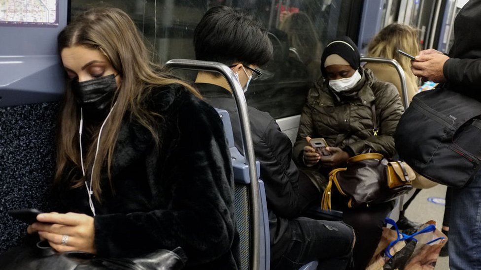 People wearing face masks ride a subway train as second wave of new coronavirus (Covid-19) hits Paris, France on October 27, 2020.