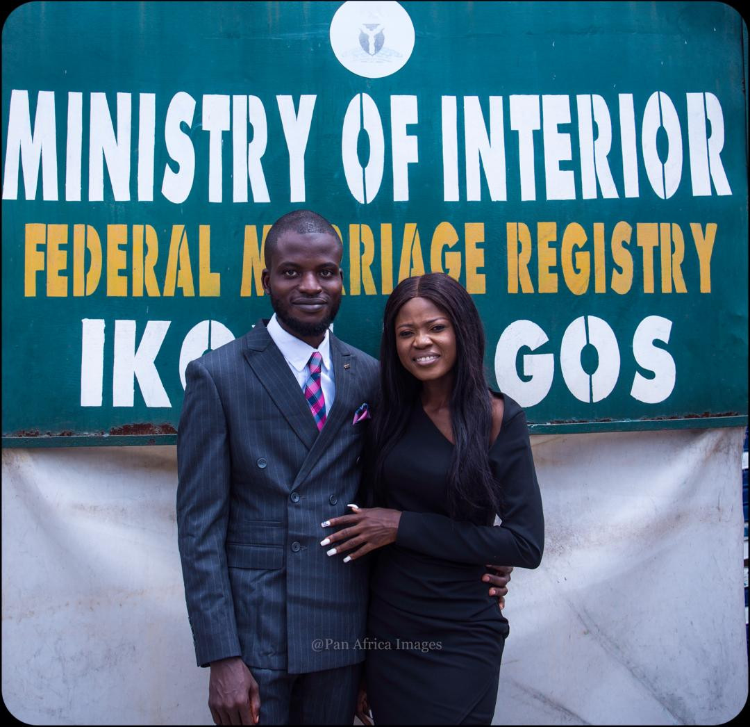 Photos of man who joined the #EndSARS protest in his wedding suit shortly after tying the knot