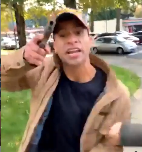 Trump?s supporter pulls a gun on protesters after a liquid was dumped on him (video)