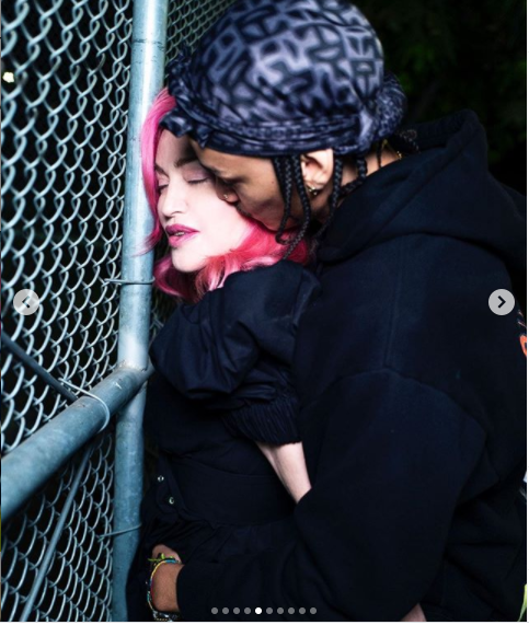  Singer, Madonna, 62, gets a kiss from her 26-year-old boyfriend Ahlamalik Williams during steamy photoshoot (photos)