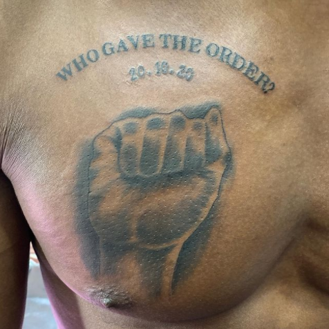  #EndSARS protester tattoos date of Lekki tollgate shooting on his chest (photo)
