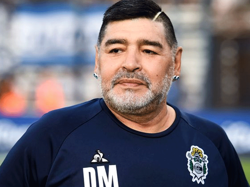 Funeral employee sacked for taking sickening selfie with Diego Maradona