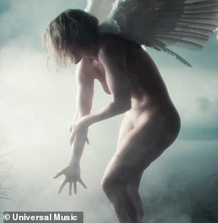 Jennifer Lopez strips completely as she dances in forest in new video