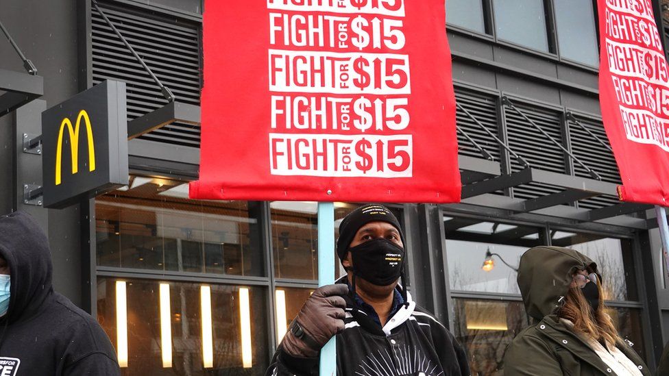 Demonstrators participate in a protest outside of McDonald's corporate headquarters on January 15, 2021 in Chicago, Illinois. The protest was part of a nationwide effort calling for minimum wage to be raised to -per-hour