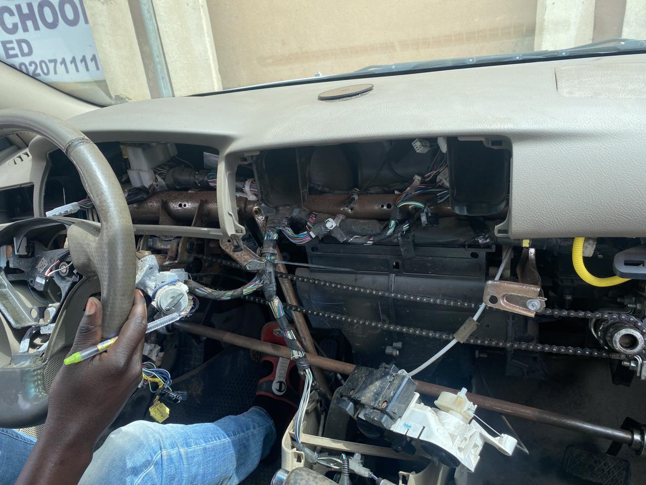 Woman surprised by car a driving school provided to use in teaching clients