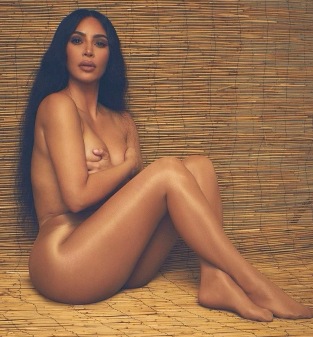 Kim Kardashian sizzles in nothing but flesh-coloured tights