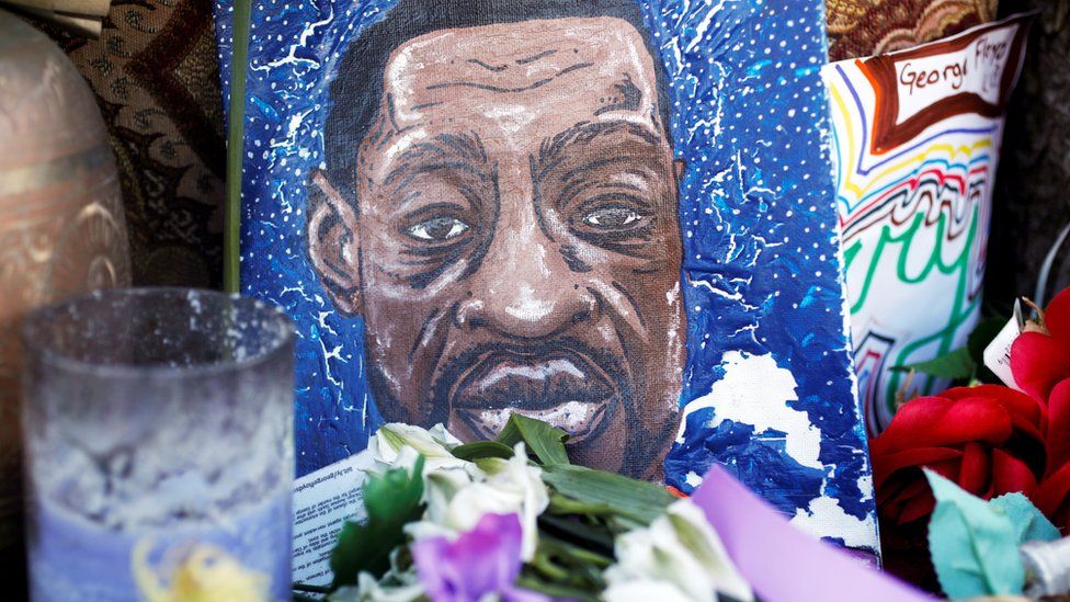 A small painting in memory of George Floyd is seen next to Cup Foods at George Floyd Square while the city of Minneapolis enters its third day of the trial of Derek Chauvin, who is facing murder charges in the death of George Floyd, in Minneapolis, Minnesota, U.S., March 31, 2021.