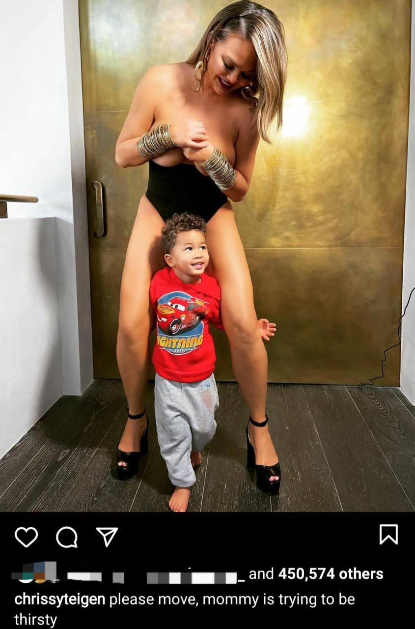 Chrissy Teigen shares topless photo