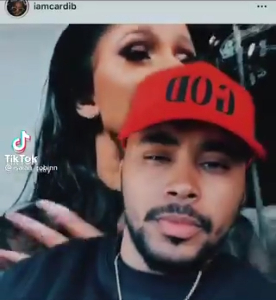Cardi B reacts after she
