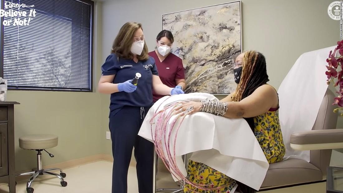 Woman with Guiness World Record for longest fingernails cuts them after nearly 30 years