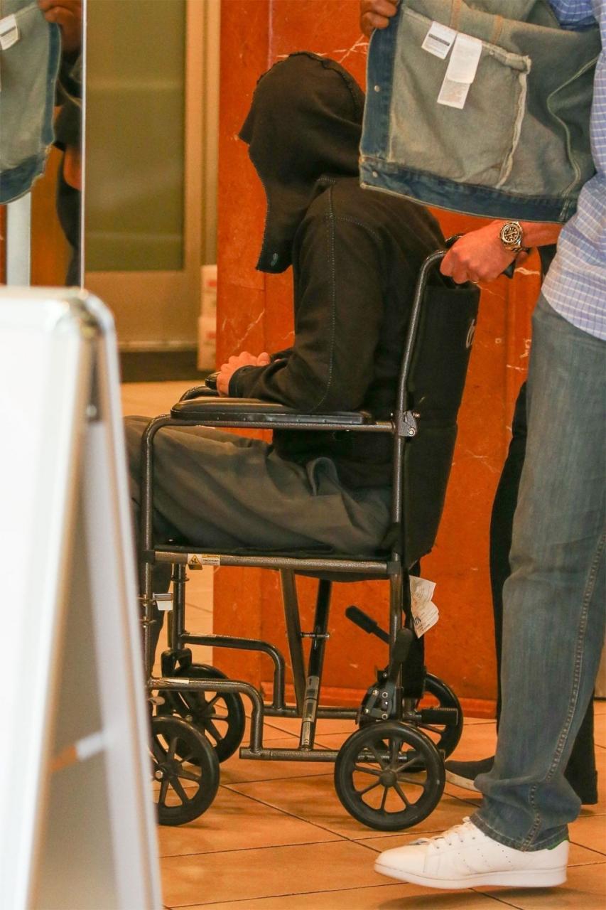 Actor, Brad Pitt leaves medical centre in a wheel chair (photos)