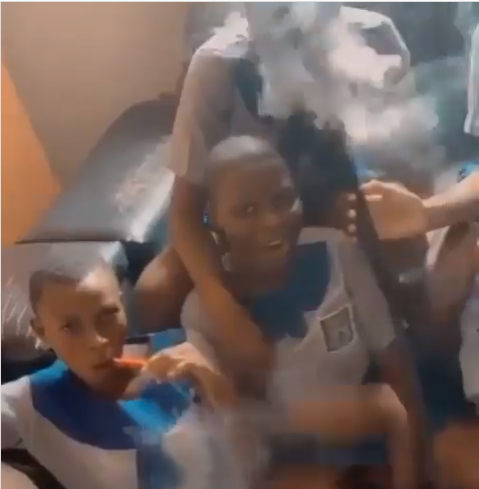 Disturbing video shows young school girls in their uniforms smoking shisha inside a sitting room