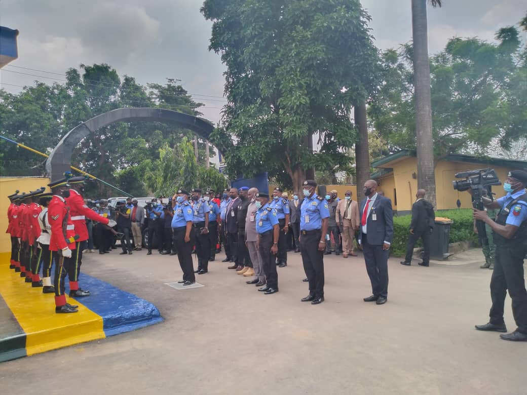 Officers and guests run for safety as heavy wind disrupts reception organized for IGP Baba
