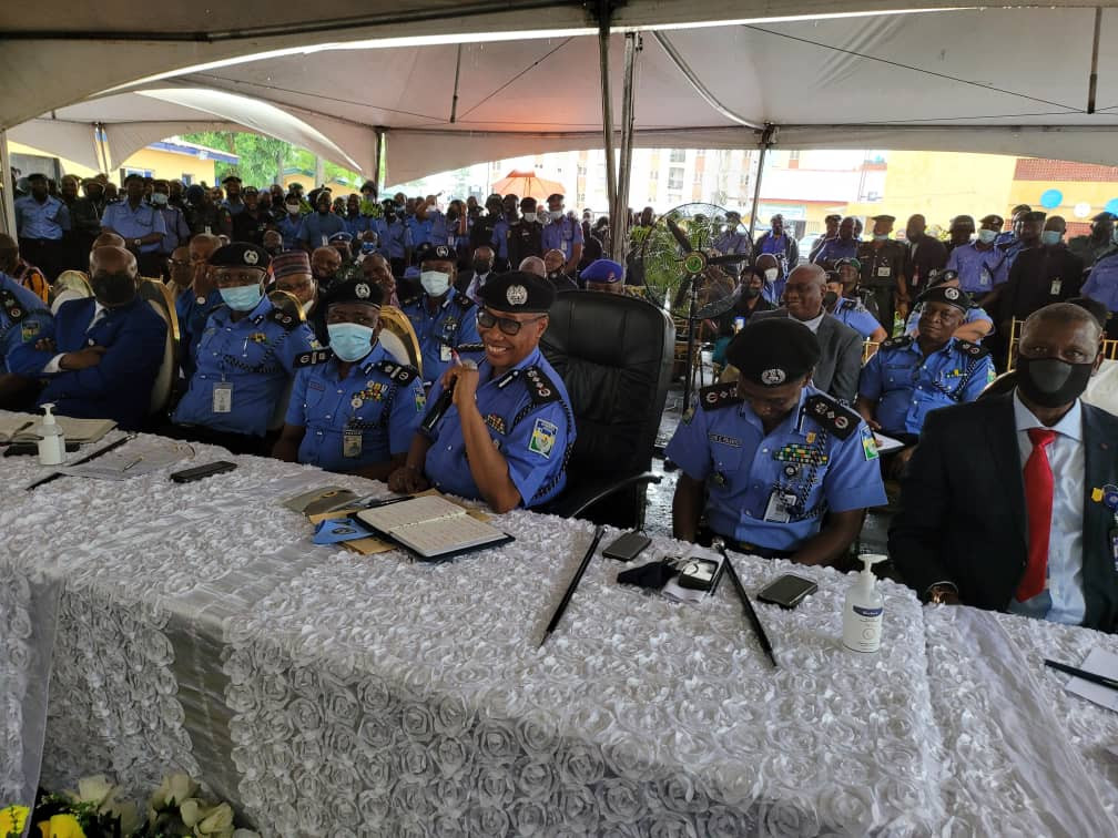 Officers and guests run for safety as heavy wind disrupts reception organized for IGP Baba