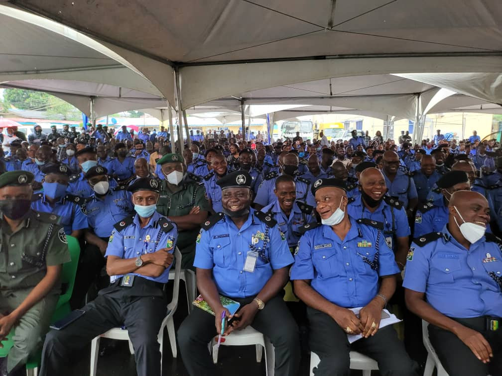 Officers and guests run for safety as heavy wind disrupts reception organized for IGP Baba