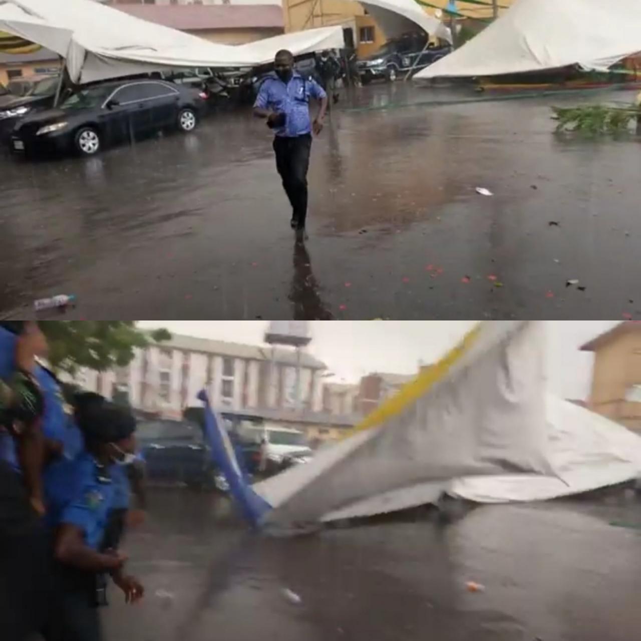 Officers and guests run for safety as heavy wind disrupts reception organized for IGP Baba
