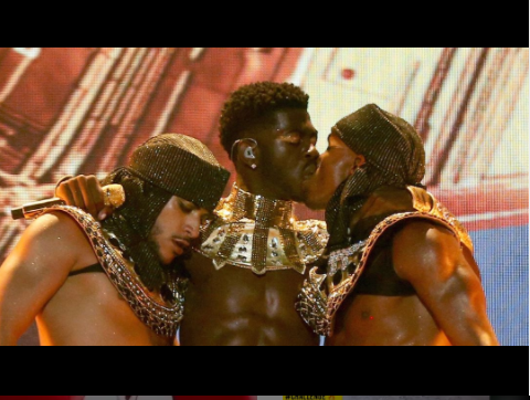 Lil Nas X kisses a male dancer on stage at 2021 BET Awards, before slamming critics on Twitter for claiming he disrespected his
