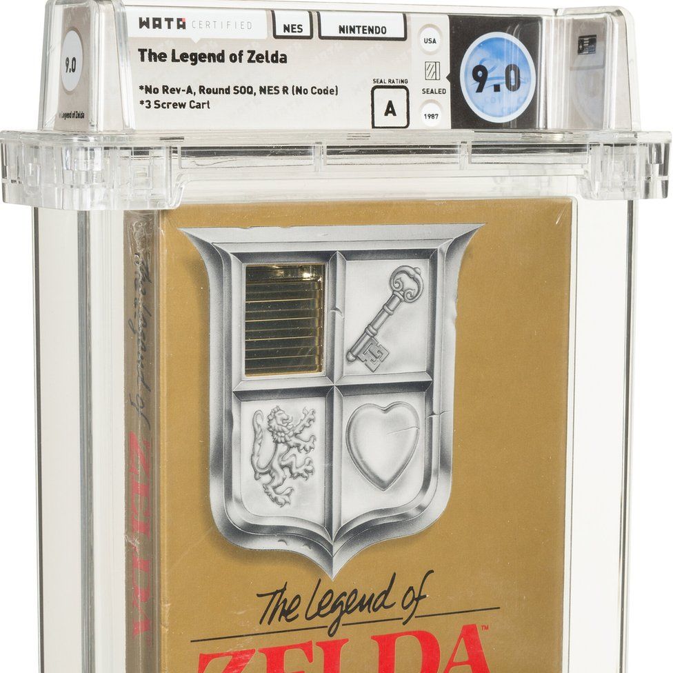The gold Legend of Zelda cartridge box