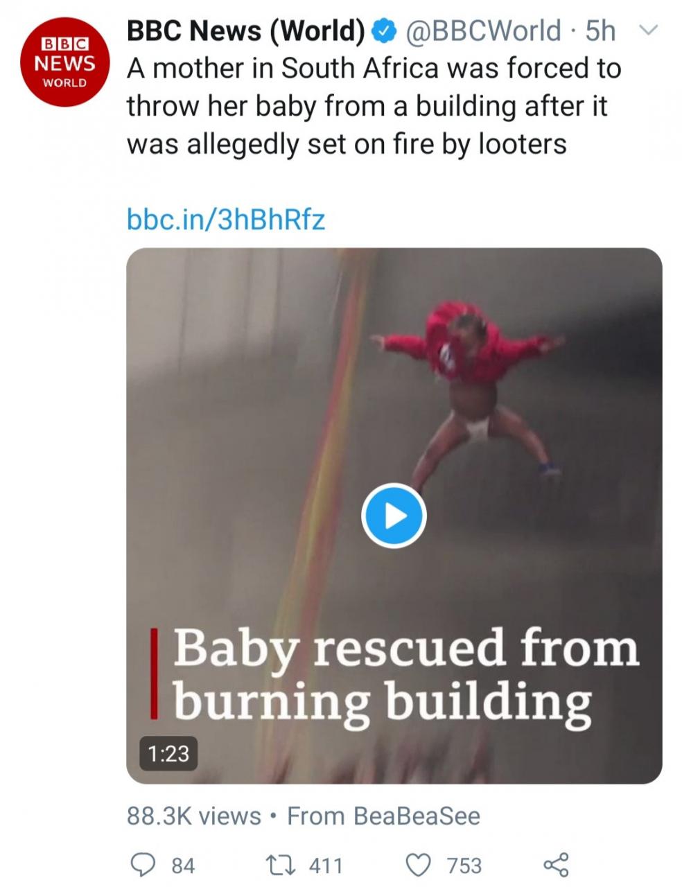 Toddler thrown from burning building in South Africa after looters set it on fire (video)