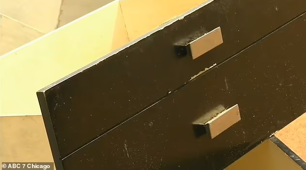 Newborn baby draped in rosary is found alive inside a drawer of an abandoned dresser in Chicago alley