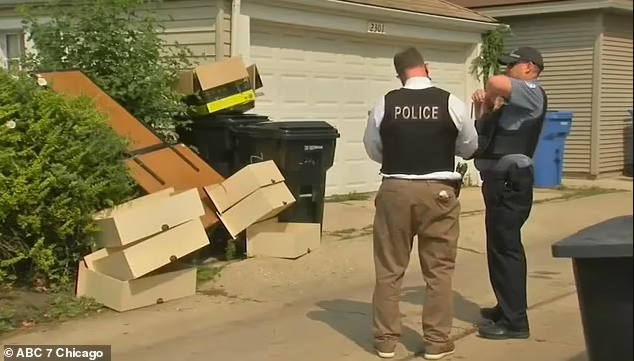 Newborn baby draped in rosary is found alive inside a drawer of an abandoned dresser in Chicago alley