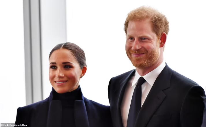 Prince Harry and Meghan Markle visit the 9/11 memorial and One World Trade Center during their first major public appearance since welcoming daughter (photos)