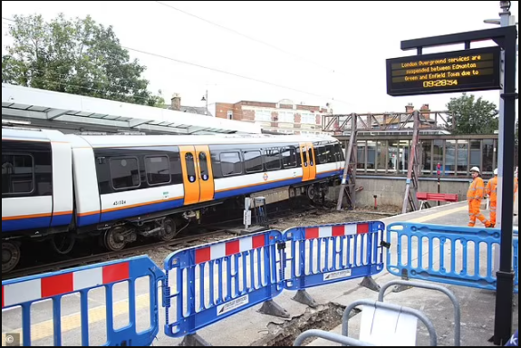?50 passengers evacuated as London Overground train derails and crashes through barriers (Photos)