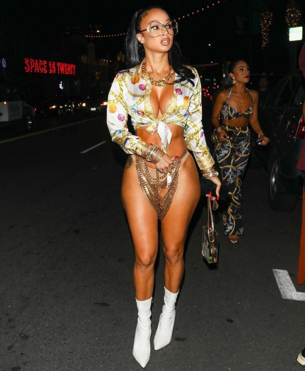 Draya Michelle turns heads as she attends event in skimpy chain skirt that covered nothing (photo)